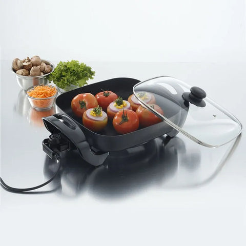 Sartén eléctrico de 30 cm con tapa de vidrio termo resistente y control de temperatura ajustable, ideal para cocinar con versatilidad y facilidad.