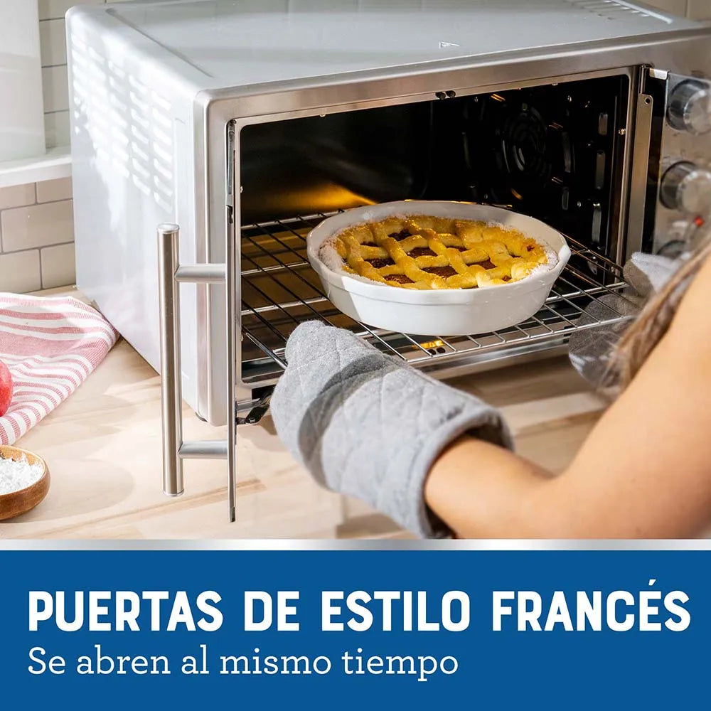 Horno con Freidora de Aire Oster® 42L con 5 funciones pre-programadas, recubrimiento antiadherente, puertas estilo francés y control de temperatura ajustable hasta 230°C.