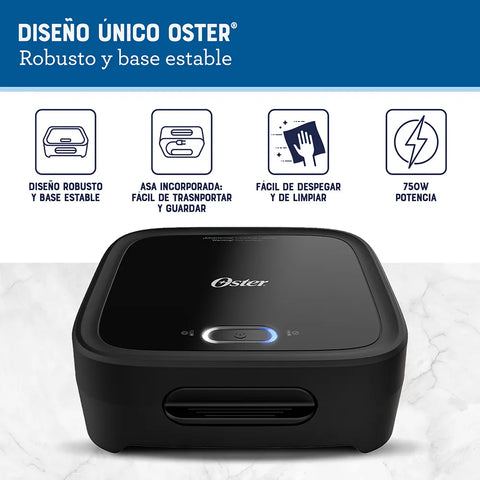 Sanduchera Oster® compacta negra con platos hondos, ideal para panes gruesos, rellenos generosos y preparaciones versátiles.