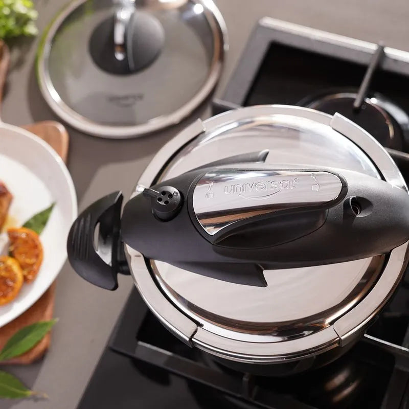 Olla a presión de acero inoxidable de 4 litros con sistema abre fácil y cinco sistemas de seguridad.