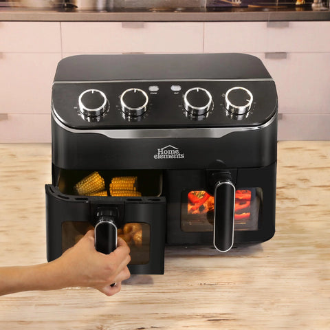 Freidora de Aire Home Elements de 8 litros con doble canastilla, luz interna, control de temperatura independiente y diseño antiadherente para preparaciones saludables.