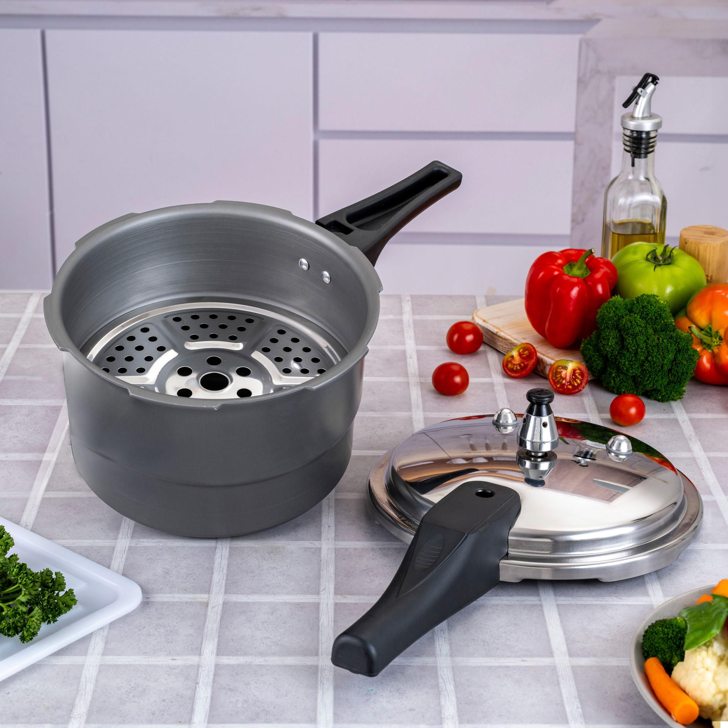 Olla a presión anodizada de 4.2 litros Home Elements, diseño duradero y seguro con sistemas avanzados de seguridad, ideal para cocción rápida y saludable.