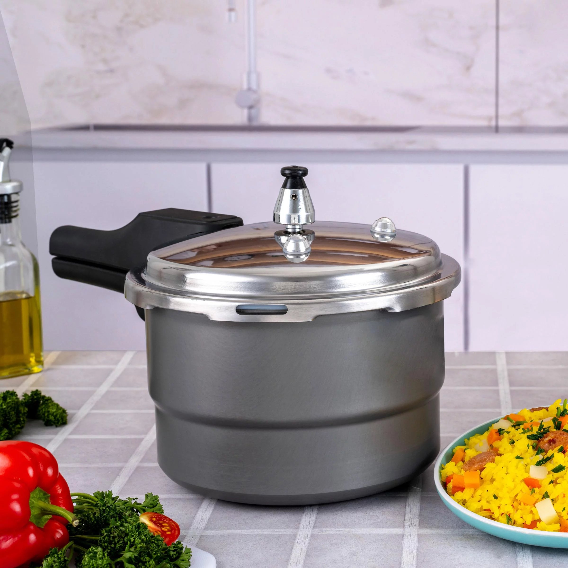 Olla a presión anodizada de 4.2 litros Home Elements, diseño duradero y seguro con sistemas avanzados de seguridad, ideal para cocción rápida y saludable.