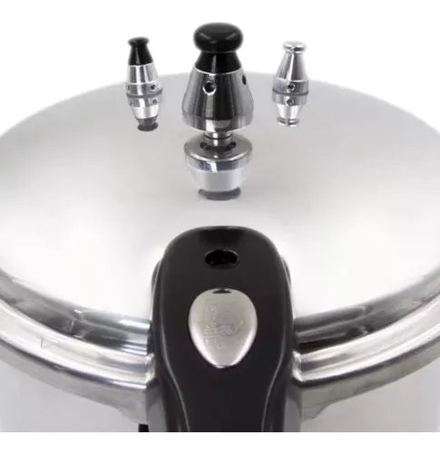 Olla a Presión Cierre Externo 4,2 Litros Home Elements, apta para estufas eléctricas y a gas, con accesorios resistentes al calor.