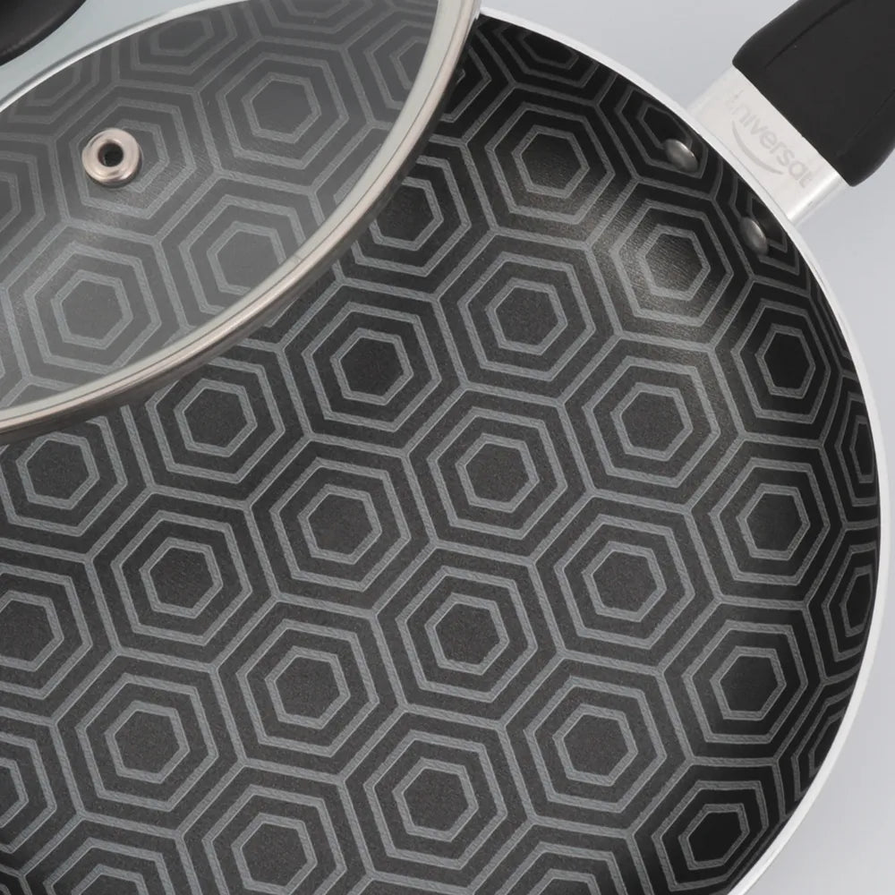 Sartén 6 Ultra de 18cm con recubrimiento antiadherente estampado y tapa de vidrio templado, ideal para cocinar de forma saludable y baja en grasa.