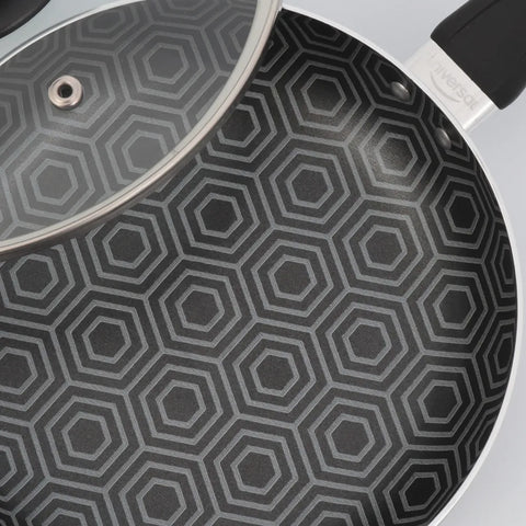 Sartén 6 Ultra de 18cm con recubrimiento antiadherente estampado y tapa de vidrio templado, ideal para cocinar de forma saludable y baja en grasa.